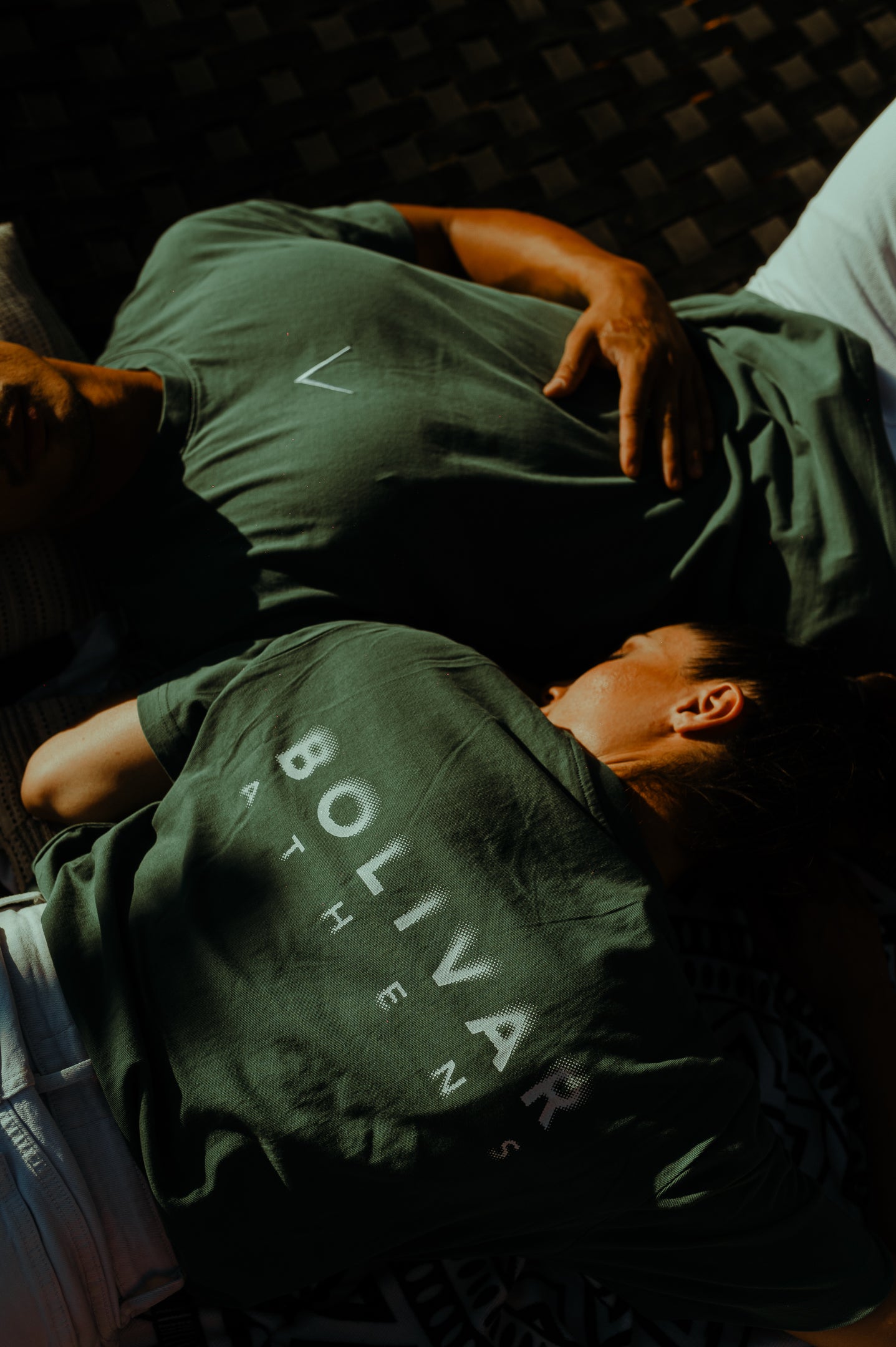 White Spray Logo/ Roof Embroidery On Green Bay Top