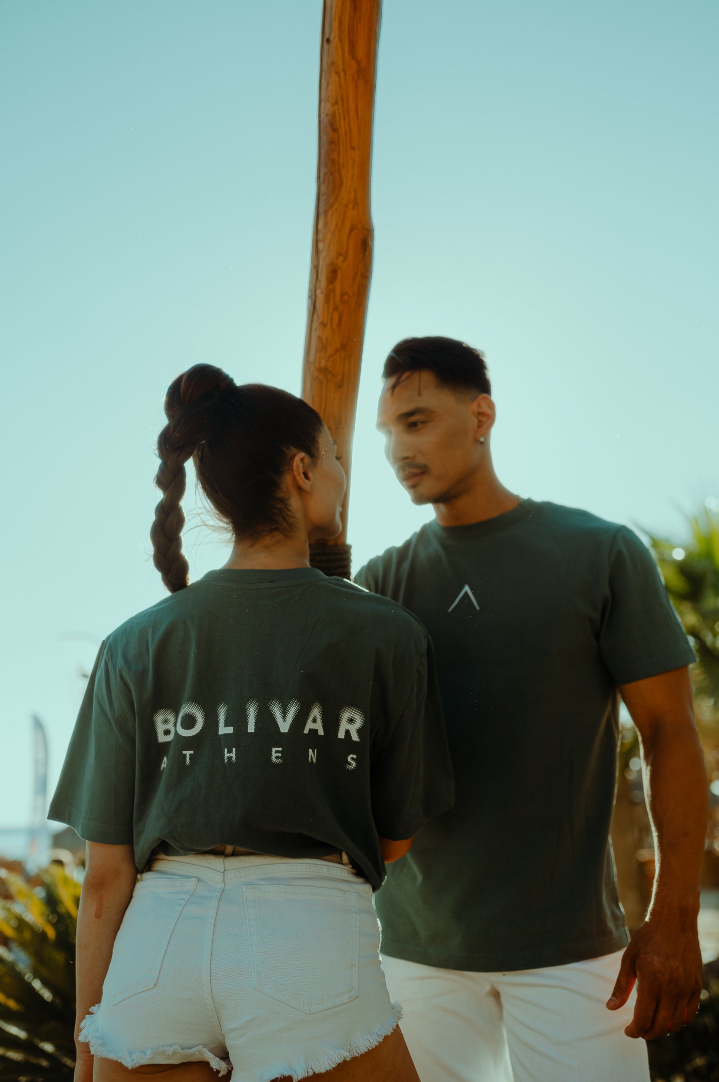 White Spray Logo/ Roof Embroidery On Green Bay Top